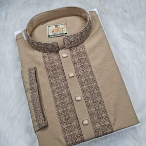 Golden Panjabi with detailed flat embroidery on the front and collar, neatly folded on a soft fur background.