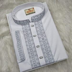 White Panjabi with detailed flat embroidery on the front and collar, neatly folded on a soft fur background.